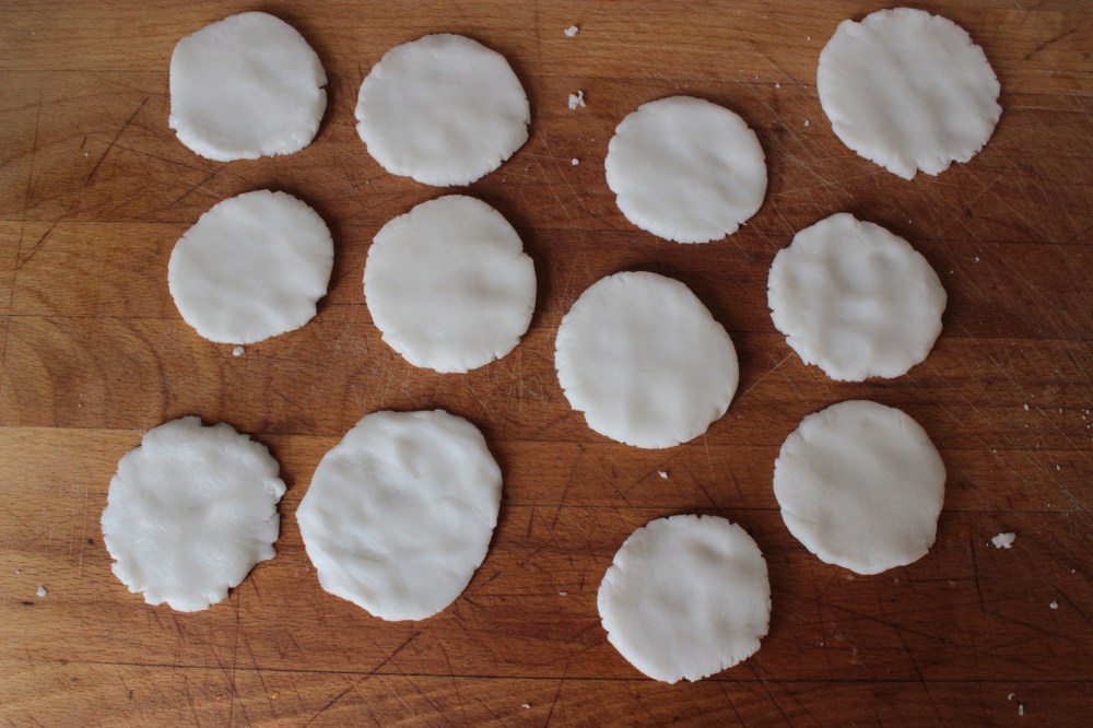 flattened lumps of gluten-free dumpling dough