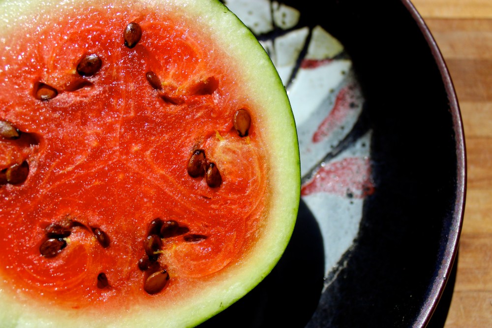 Watermelon on pottery by Regina Whickham.